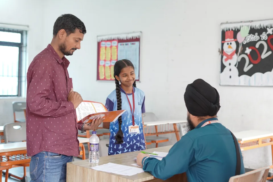 Parents and teachers during the 2026 annual parent–teacher meeting at BOMIS Naubatpur