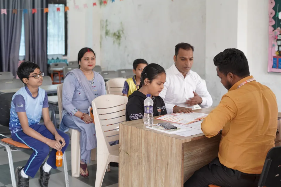 Parents and teachers during the 2026 annual parent–teacher meeting at BOMIS Naubatpur