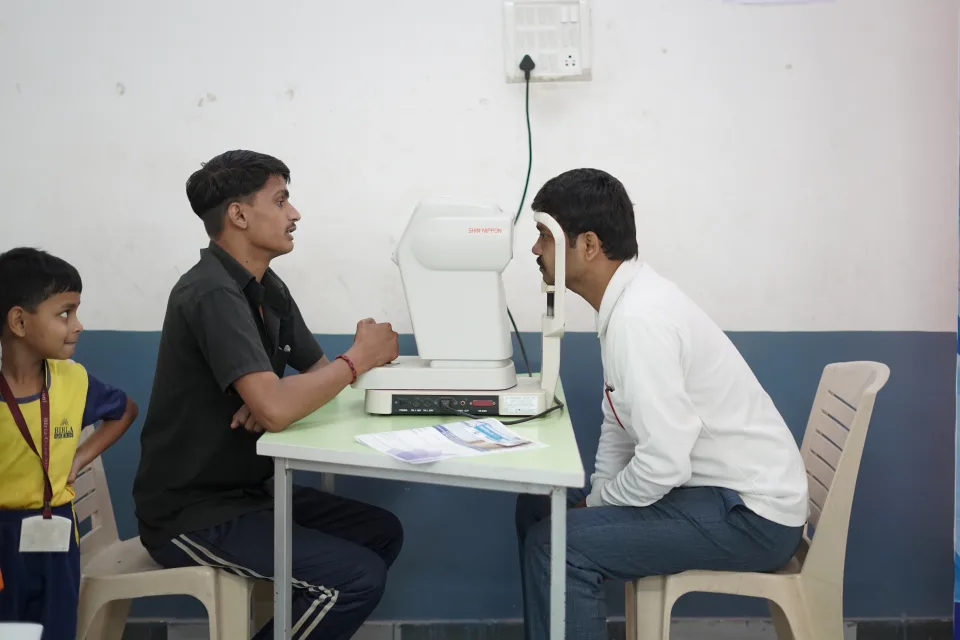 School community participating in the March 2026 medical camp at BOMIS Naubatpur