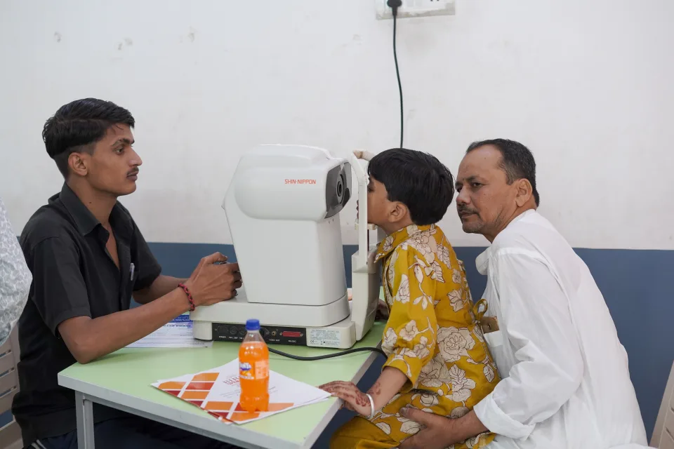 School community participating in the March 2026 medical camp at BOMIS Naubatpur