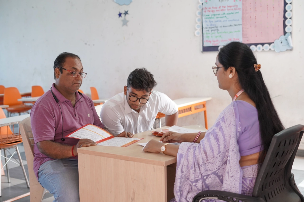 Parents and teachers during the 2026 annual parent–teacher meeting at BOMIS Naubatpur