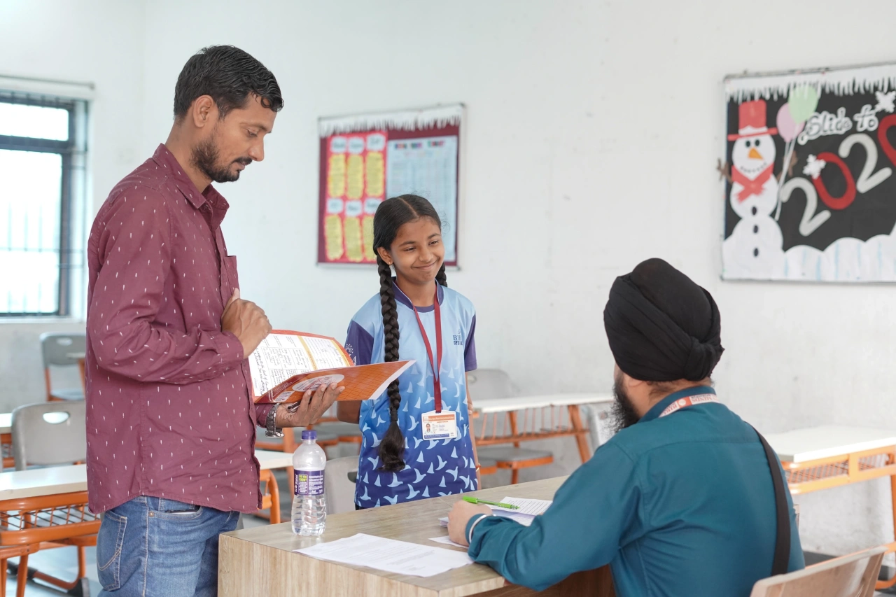 Parents and teachers during the 2026 annual parent–teacher meeting at BOMIS Naubatpur