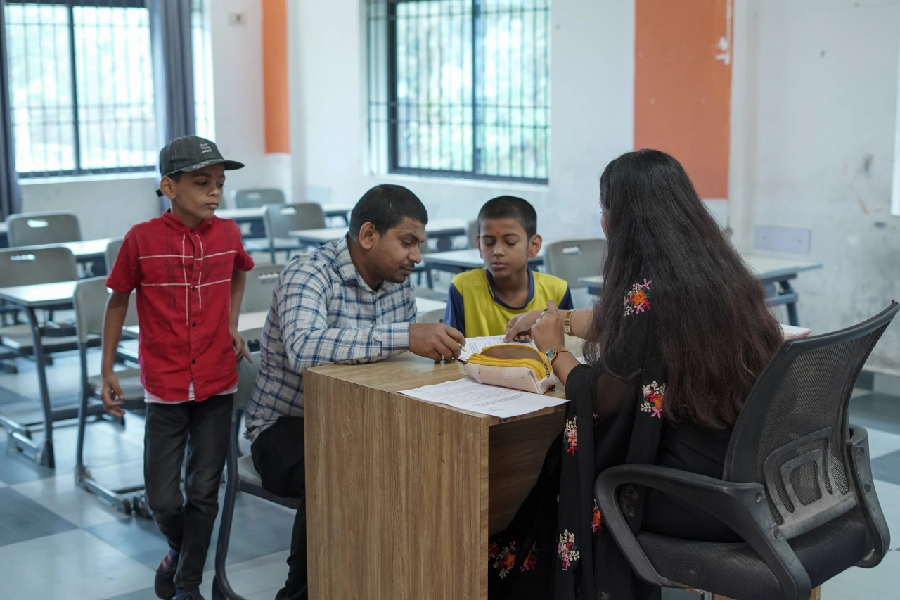 Parents and teachers during the 2026 annual parent–teacher meeting at BOMIS Naubatpur