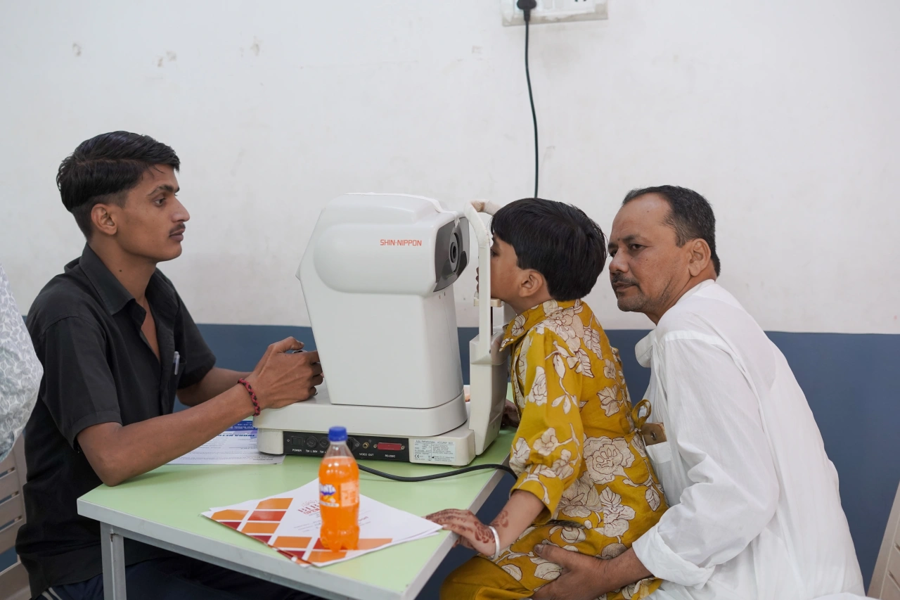 School community participating in the March 2026 medical camp at BOMIS Naubatpur